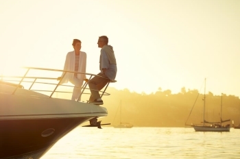 couple on boat at sunset